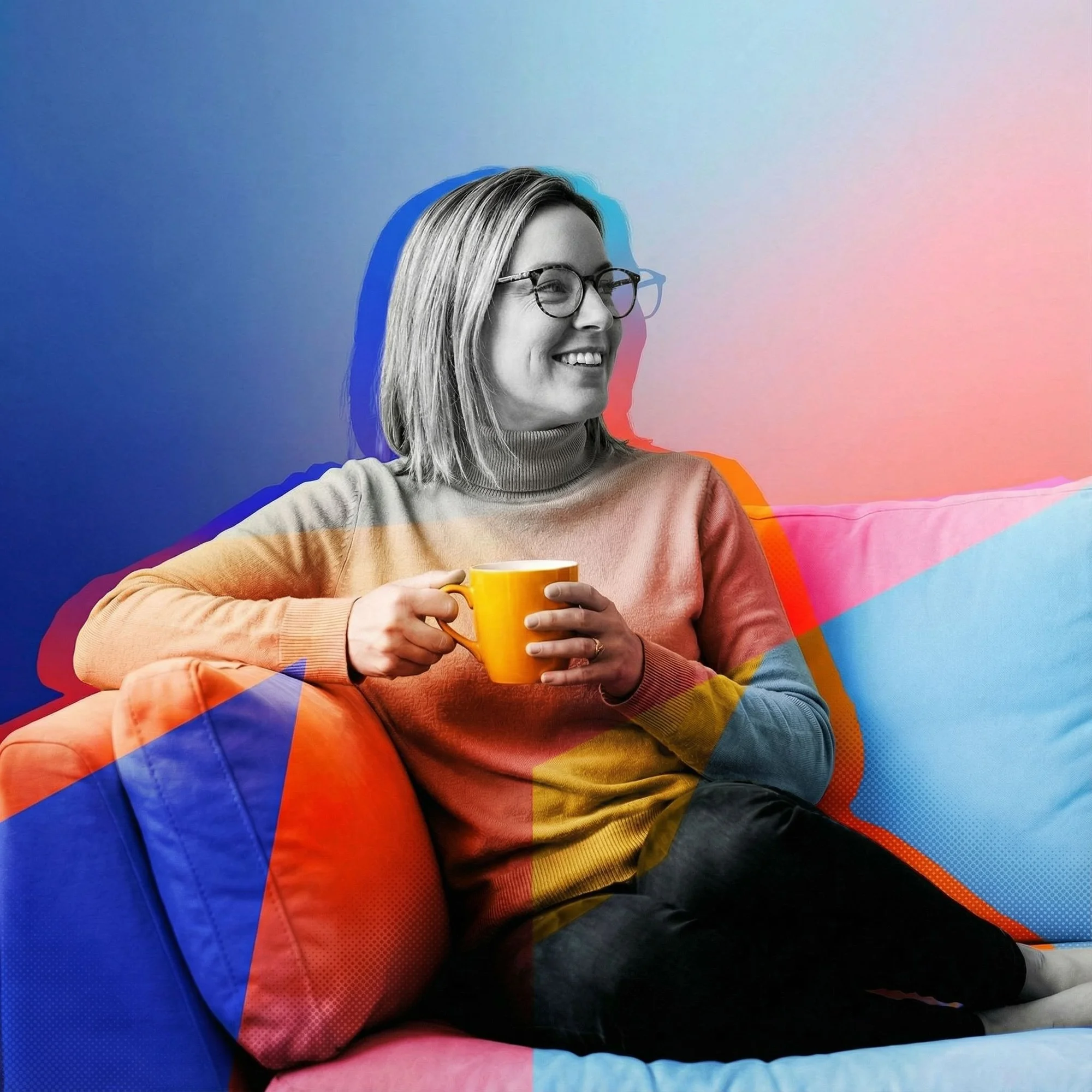 Happy customer relaxing on colourful sofa with coffee